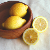 lemons in a wooden bowl 
