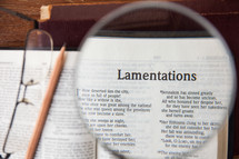 magnifying glass over Lamentations 