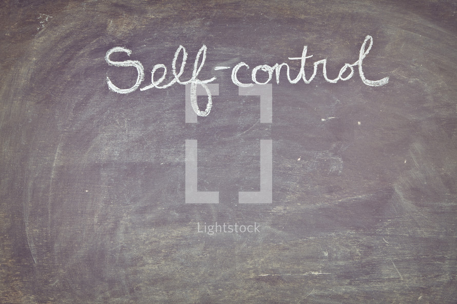 self-control written on a chalkboard