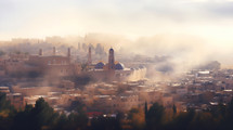 The city of Jerusalem in the morning fog as the sun comes up. 