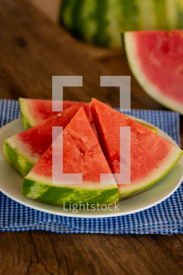 slices of watermelon on a table 