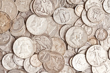 pile of old silver coins