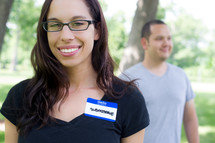 submissive name tag on a woman