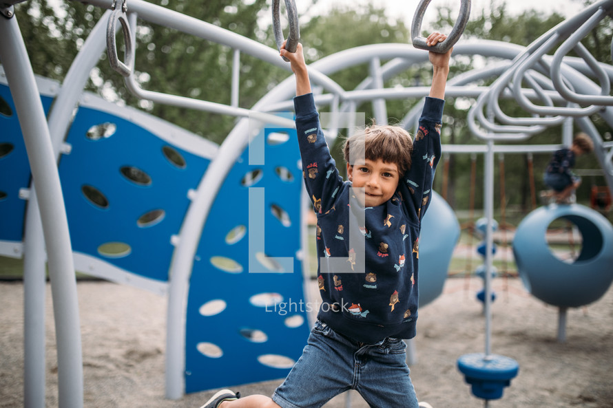 child playing on a playground 
