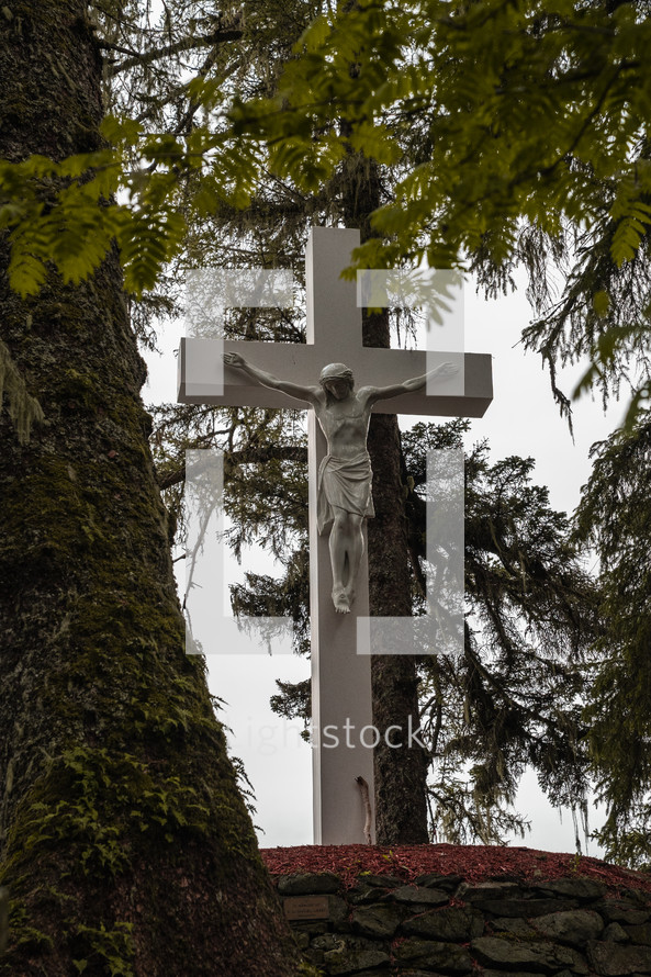 crucifix in a forest 