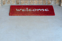 Welcome mat at the front door.