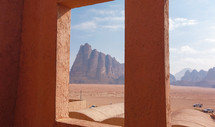 Seven Pillars of Wisdom seen from a window. Beautiful rock formation on entry in Wadi Rum.
