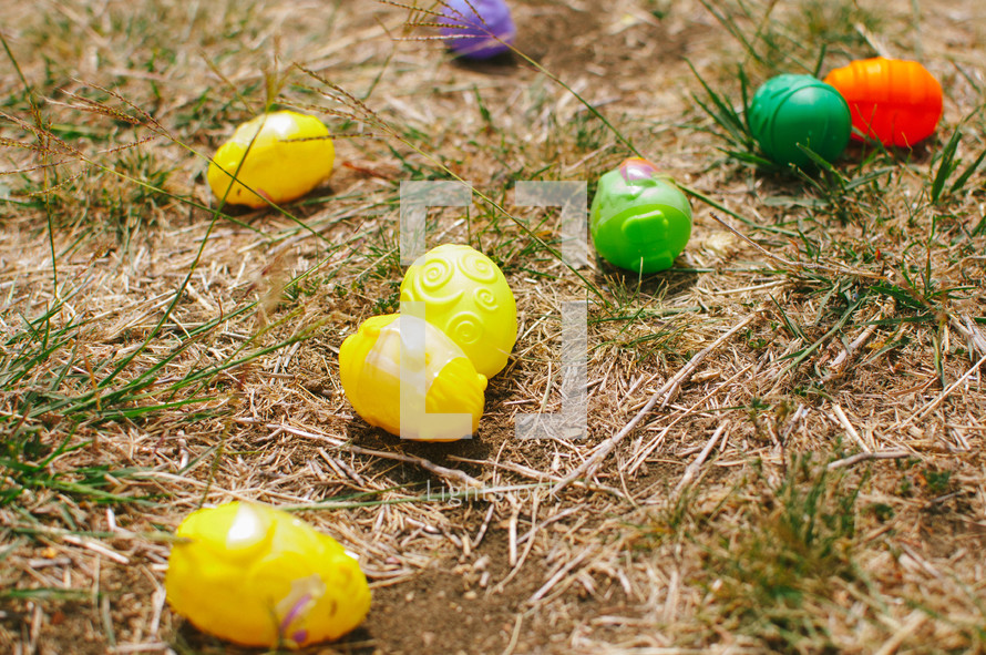 Plastic Easter eggs in the grass.