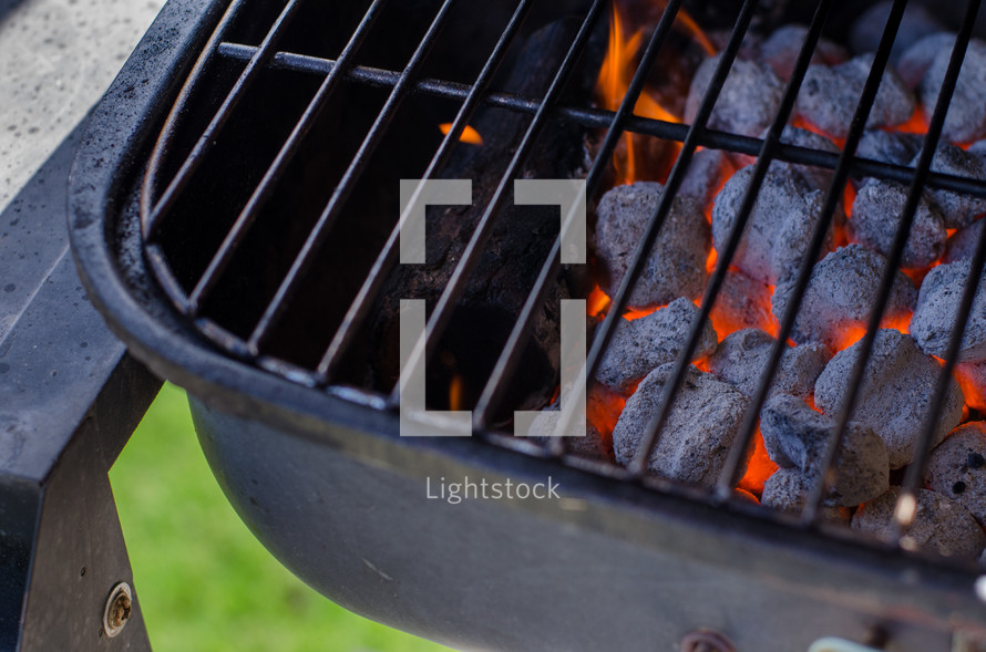 hot coals on a grill 