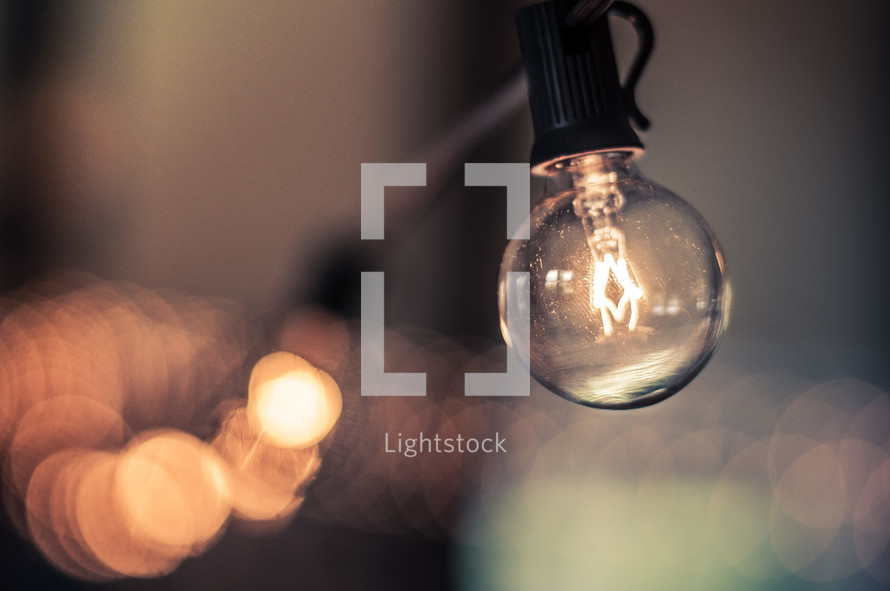 Light bulb with bokeh background