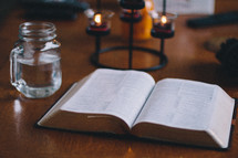 a Bible open on a table 