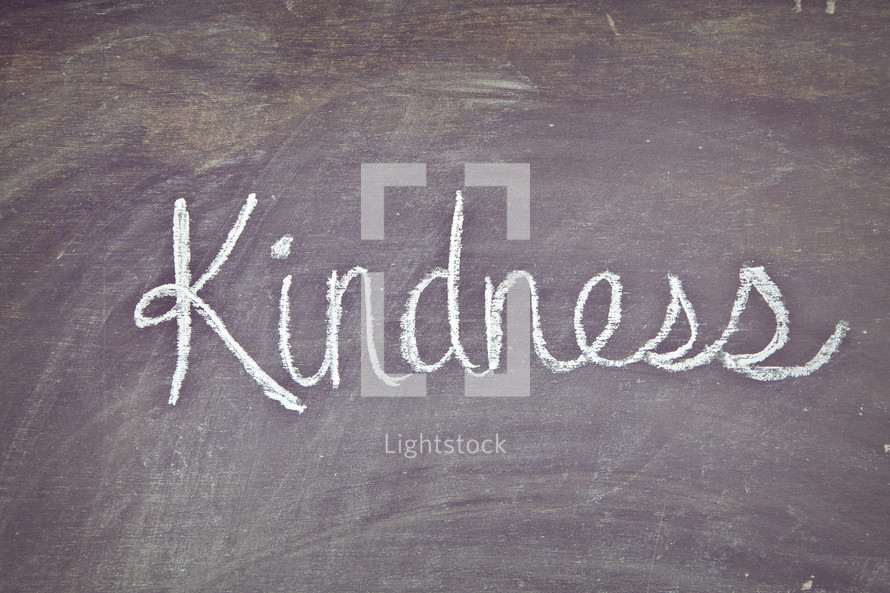 Kindness written on a chalkboard