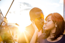 portrait of an African American couple in intense sunlight 