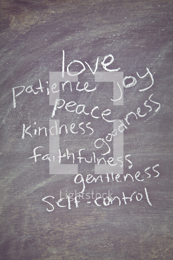The Fruit of the Spirit - love, patience, joy, peace, kindness, faithfulness, goodness, gentleness, and self-control written on a chalkboard