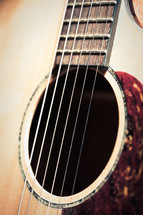 acoustic guitar strings and sound hole