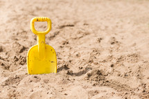 Shovel in the sand.