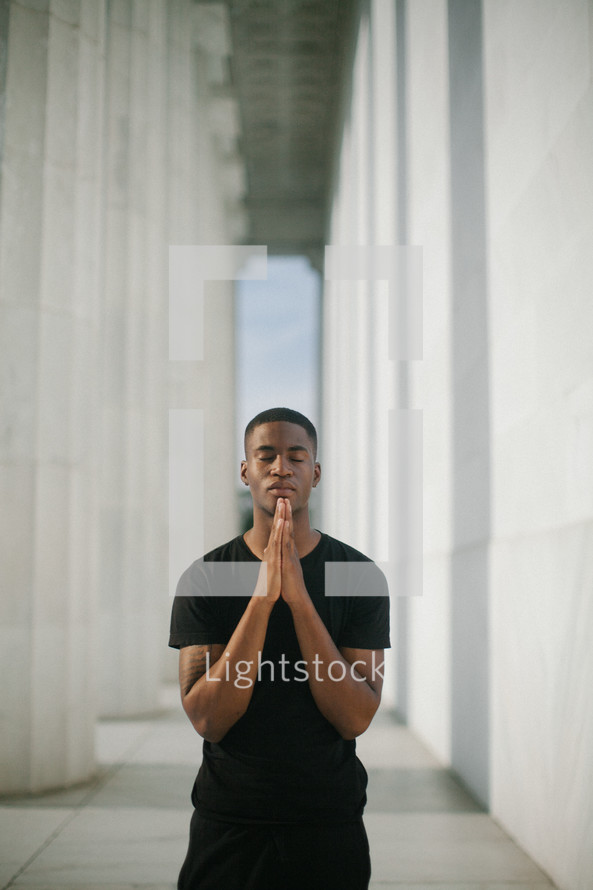 African American man in prayer