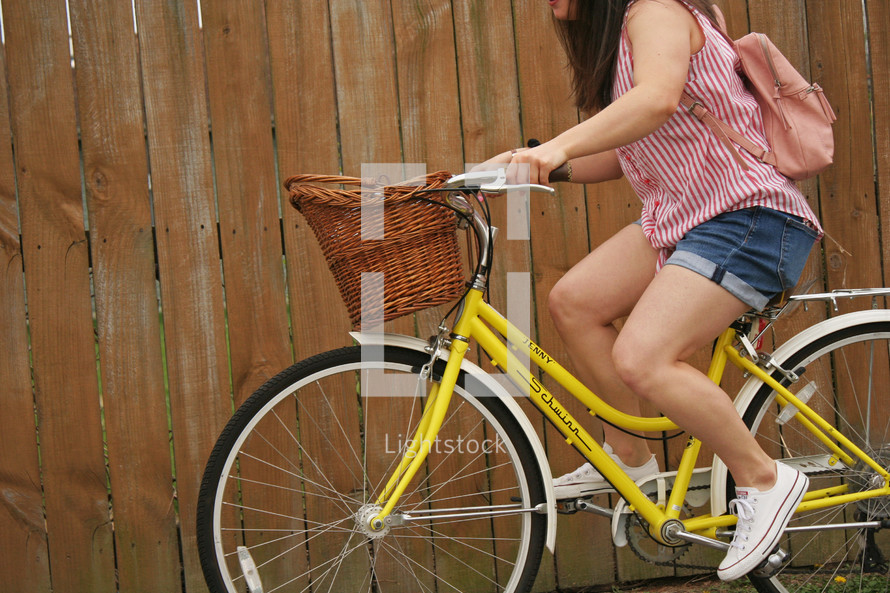 a girl riding a bike 