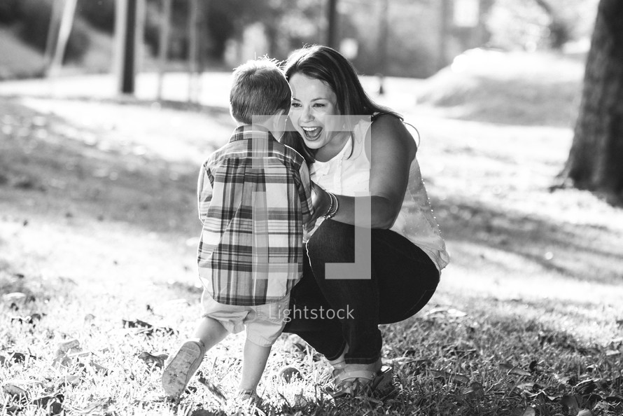 a mother and son outdoors 