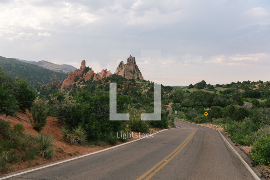 rural road through mountainous desert 