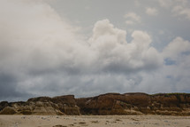 clouds over a beach and sand dunes in San Francisco