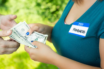 kindness name tag - woman giving money 