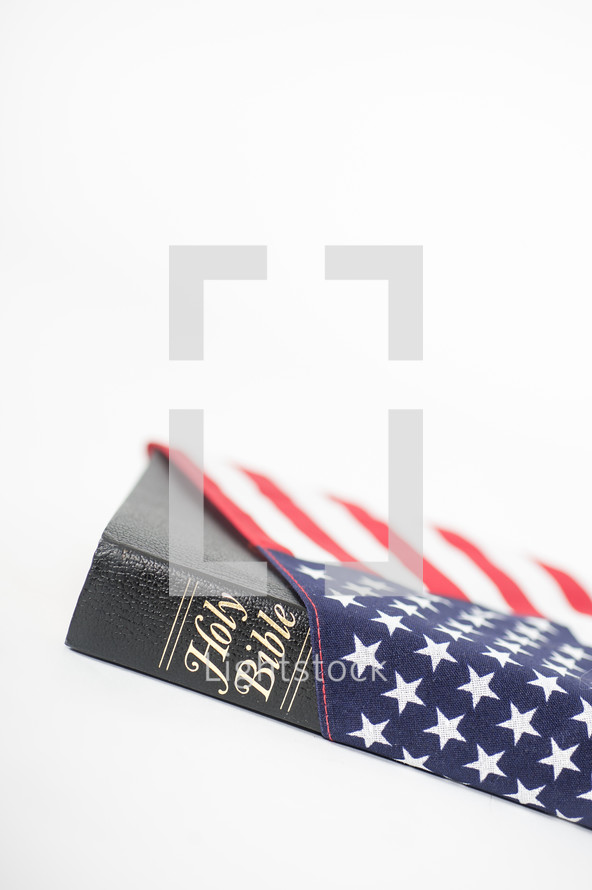 Holy Bible wrapped in an American flag.