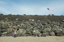 flying a kite on the beach 
