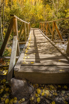 wooden foot bridge in fall 