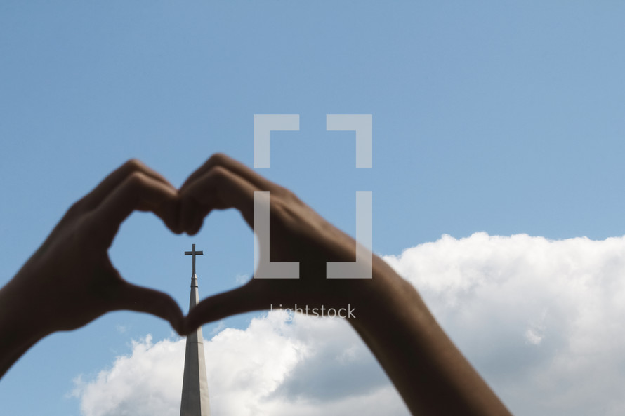 heart hands and cross on a steeple 
