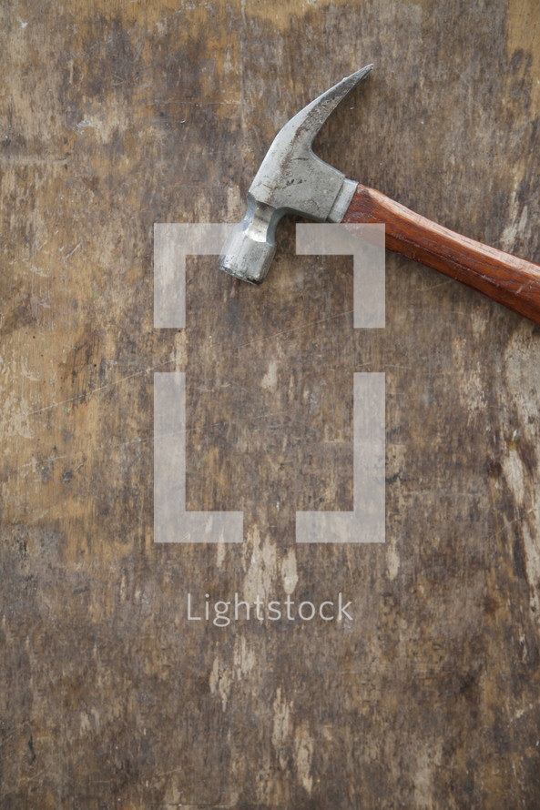Hammer on plywood.