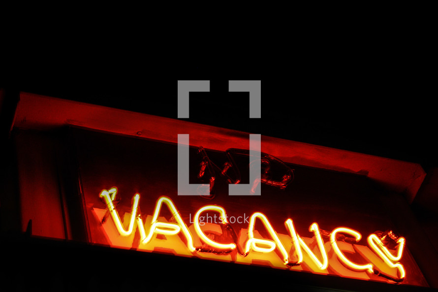 Illuminated "vacancy" sign.