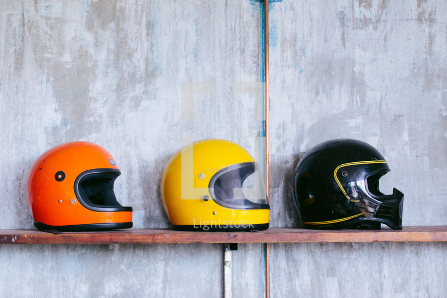 row of motorcycle helmets 