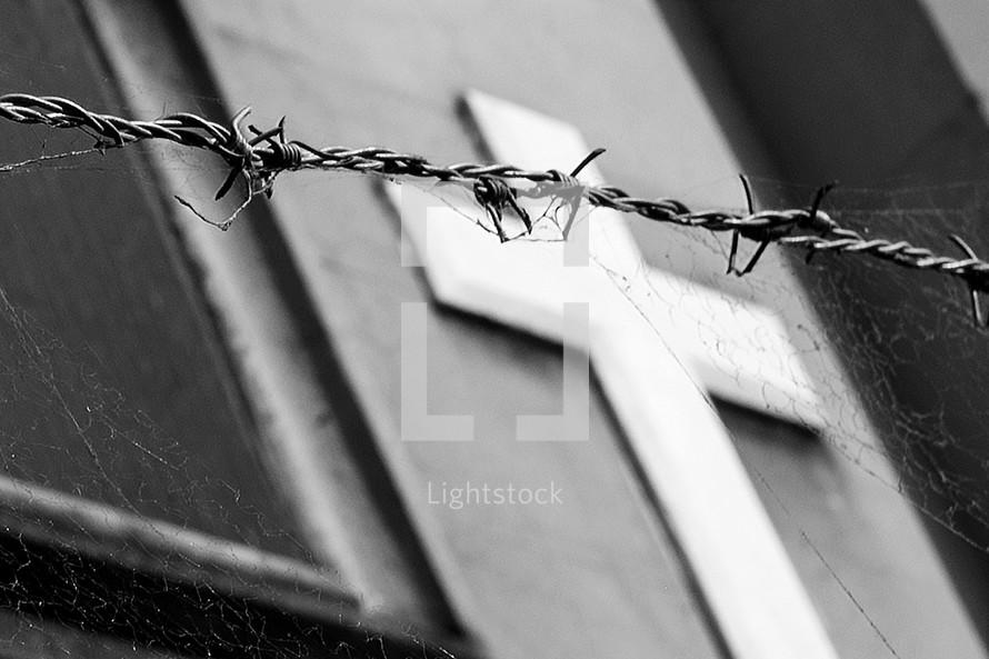 barbed wire over a cross