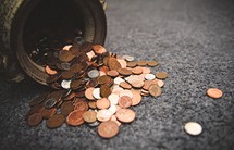 spilled pot of coins 