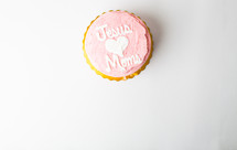 Cupcake frosted with "Jesus Loves Moms."