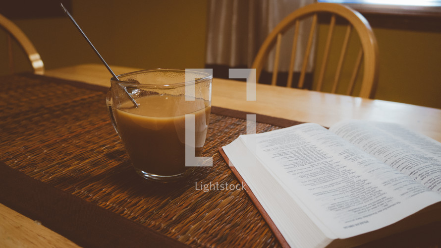 Chai latte and an open Bible. 