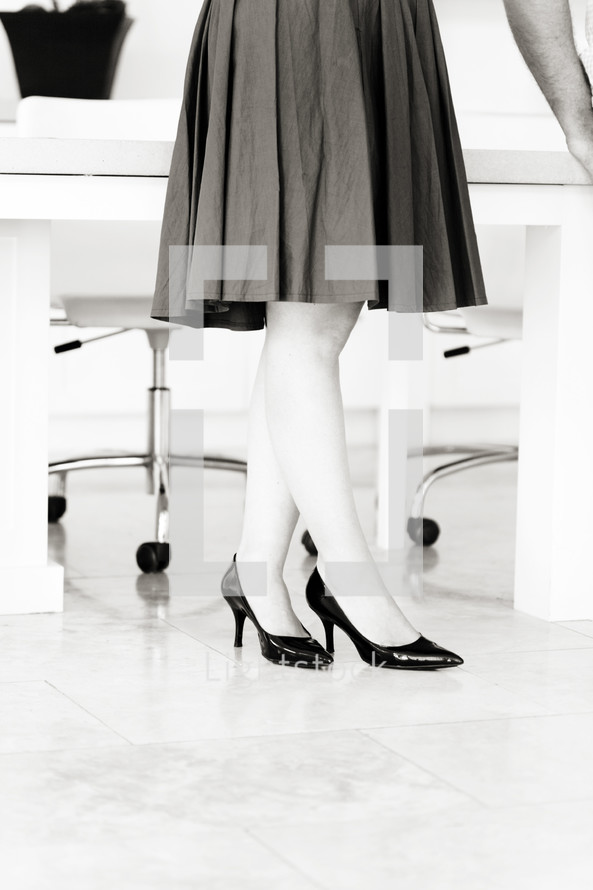 woman's feet in heels