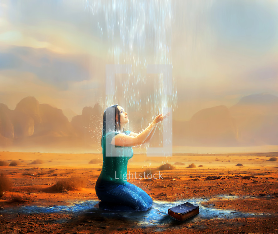 woman receives rain from heaven while in a dry desert