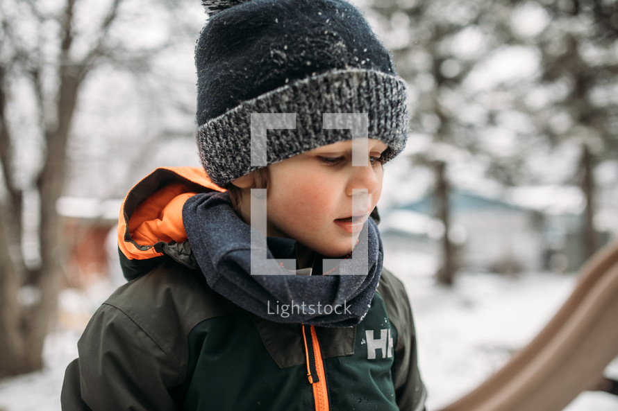 child outdoors in winter 