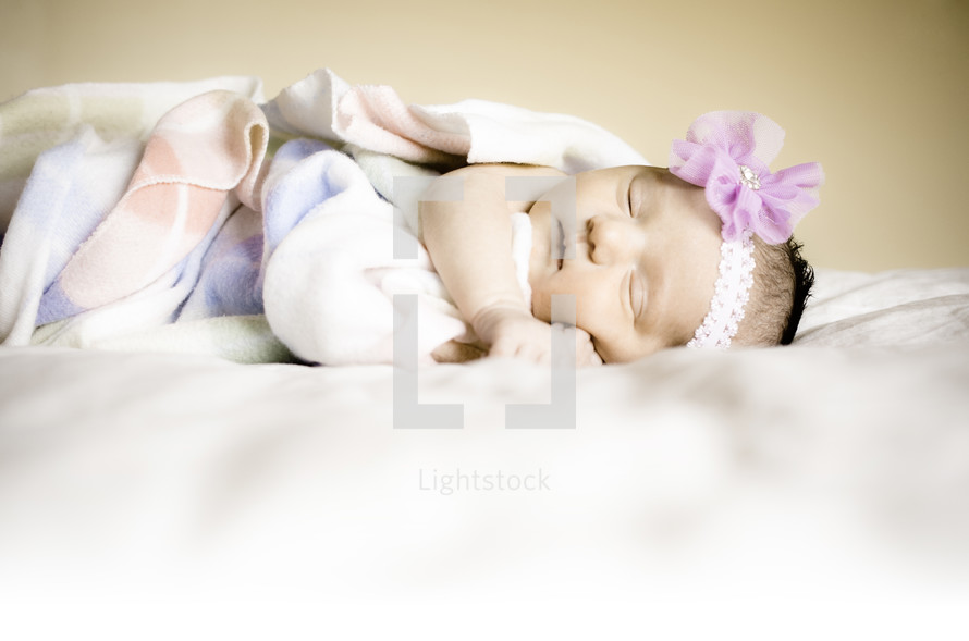 newborn baby girl sleeping 