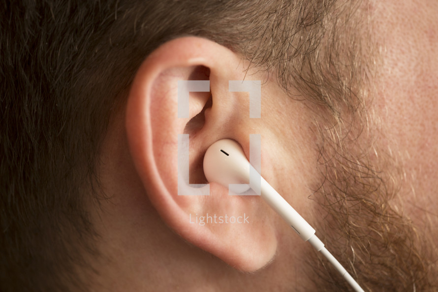 earbuds in an ear