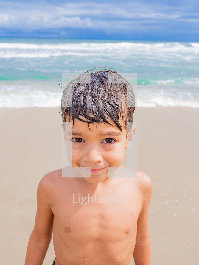 child on a beach 