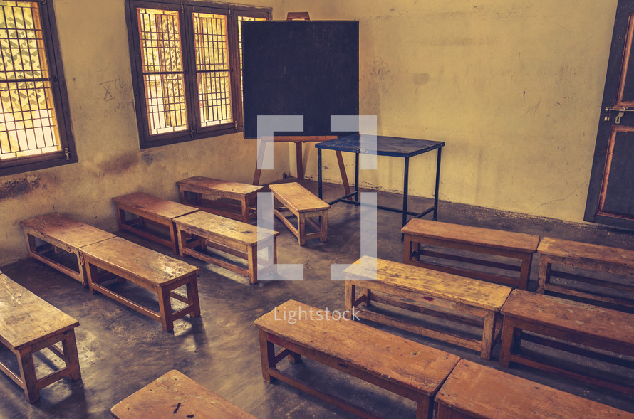 An empty classroom at an orphanage in India. 