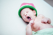 A yawning newborn.     