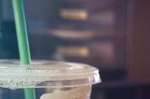 straw and lid on a plastic cup