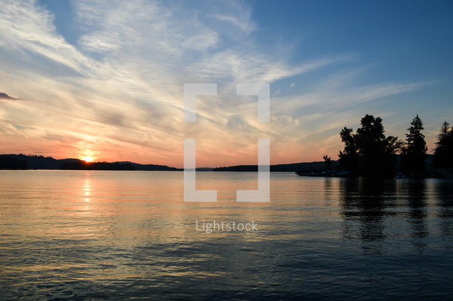 calm lake scene at sunset 