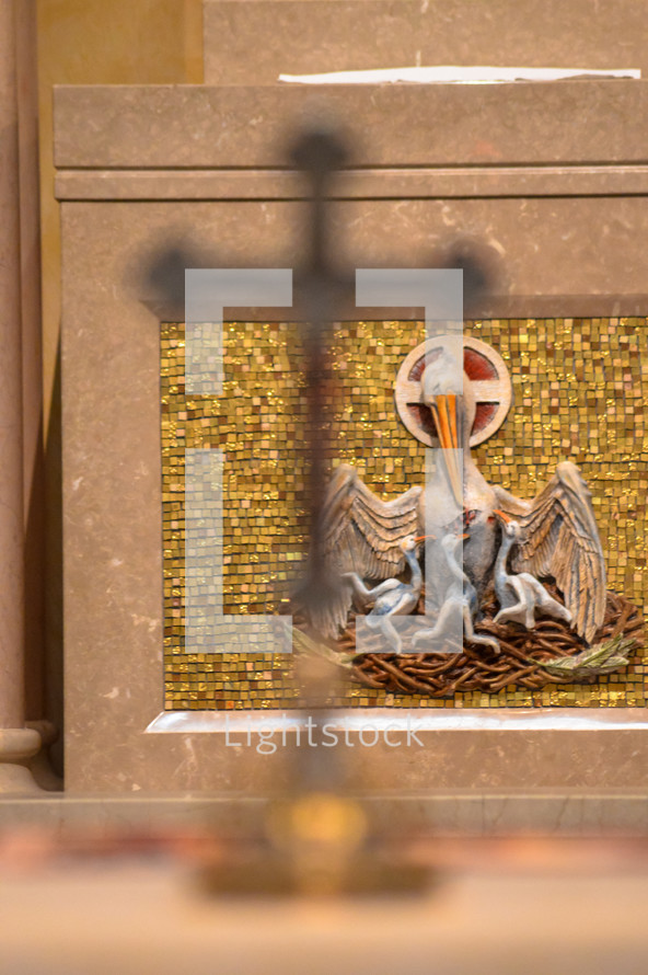 church alter with mosaic of Pelican and fledglings in a nest 