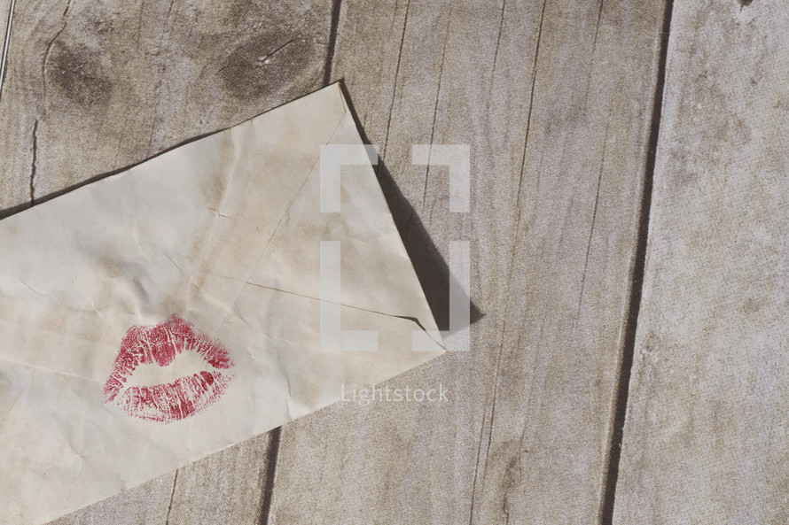 Red Lipstick on an envelope. 