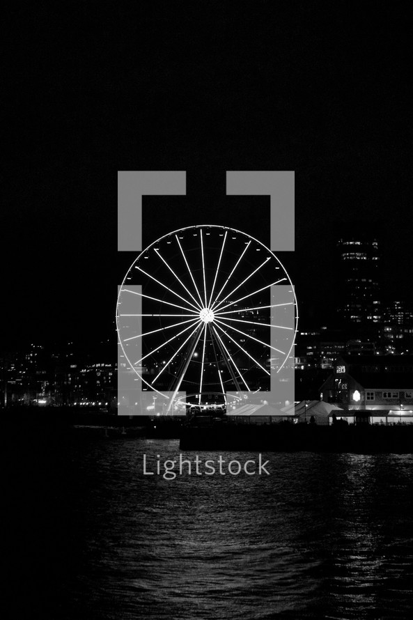 seaside ferris wheel at night 